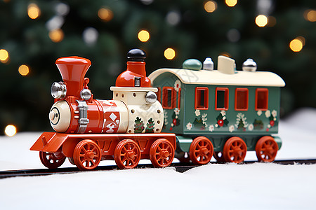 圣诞树旁的玩具火车图片