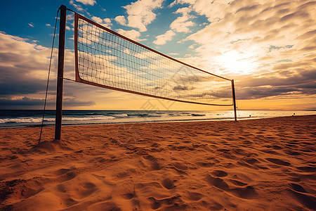 日落沙滩上的排球网图片
