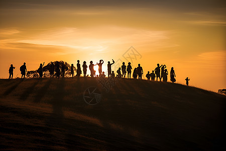 日出山顶的人群背景图片