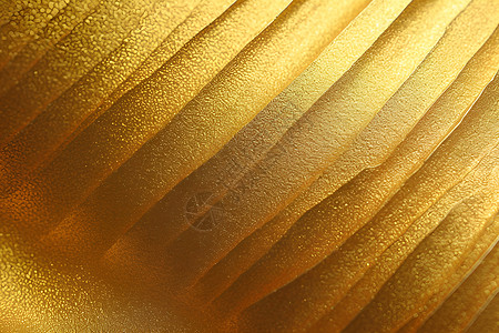 闪耀的金色墙壁背景图片