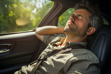 疲劳驾驶汽车休息的男子背景图片