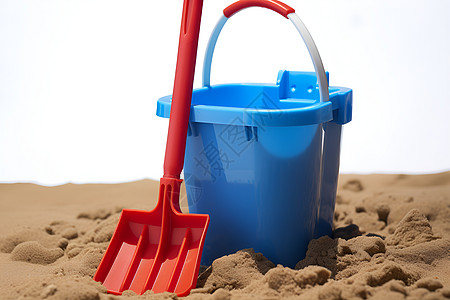 玩具沙滩蓝桶红铲图片