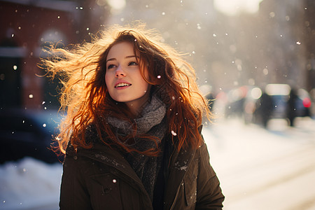 女人在雪地行走背景图片