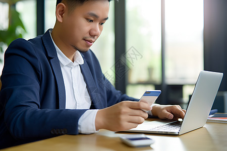 招聘字体正在办公的商务男士背景