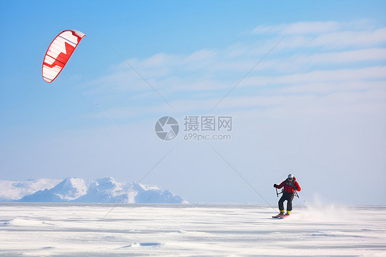 冰雪飞舞的降落伞滑雪图片