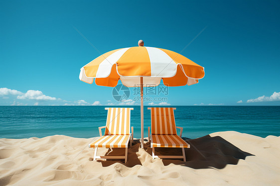 海滩上两把躺椅和一把伞图片