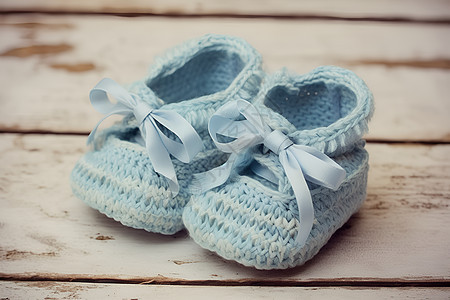 手工编织的婴儿鞋背景图片