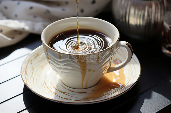 杯子中可口的咖啡图片