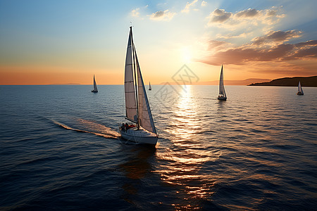 小型游艇日落海洋中的帆船群背景