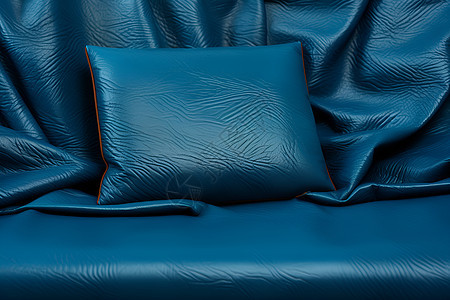 蓝色皮质沙发和枕头图片