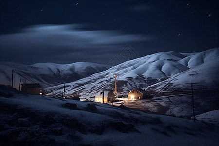 夜晚雪山中的小屋图片