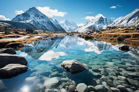 雪石头雪山下的河流背景