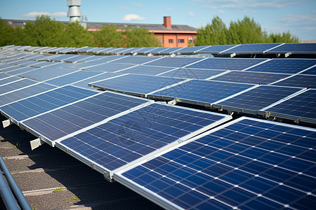 建筑屋顶上排列的一太阳能电池板背景图片