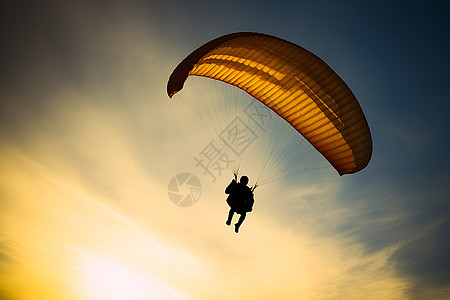 天空中降落伞上的男人图片
