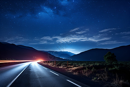 夜晚道路星空下的长路背景