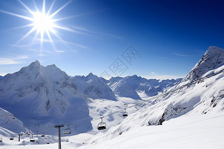 阳光下的雪山背景图片