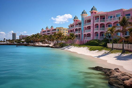 沙滩边的粉红色度假屋图片