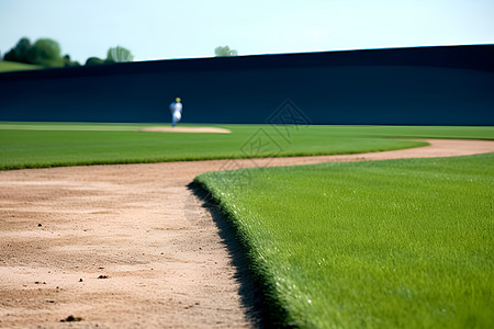 草地上的棒球场背景图片