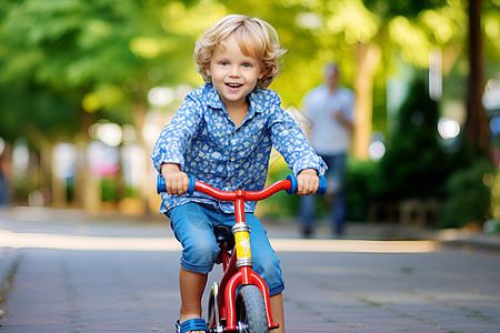 快乐骑行的小男孩背景图片