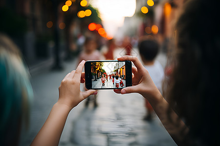 智能手机拍照拍摄街头风景的人背景