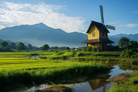 草地风车飞旋的风车在山水之间背景