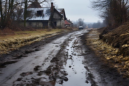 村庄泥泞小路背景图片