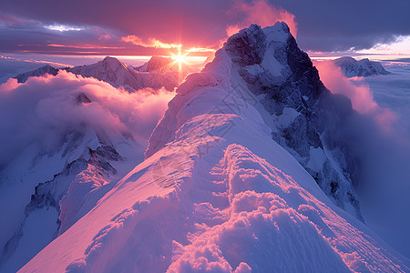 曙光映照下雪山图片