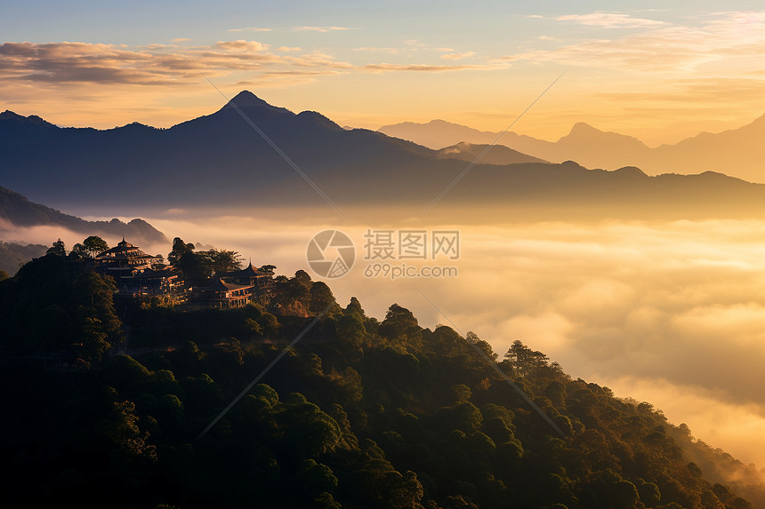 日出中的山顶小屋图片