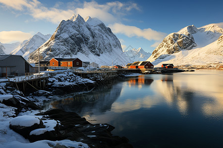 雪山前的村庄建筑图片