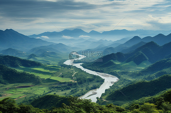 绿色山谷中一条河流图片