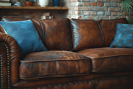 舒适的棕色真皮沙发背景图片