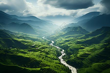 乌云下的山谷河流背景图片