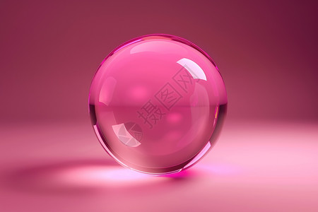 粉色背景上的粉色玻璃球图片
