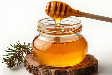 蜂蜜罐和木勺图片