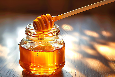 蜂蜜罐里光滑的蜂蜜图片