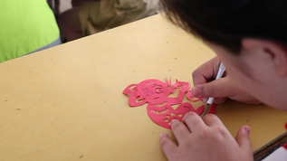 实拍小学生剪纸艺术品视频素材