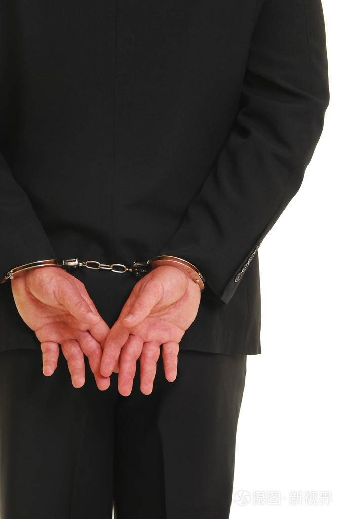 戴着手铐的商人