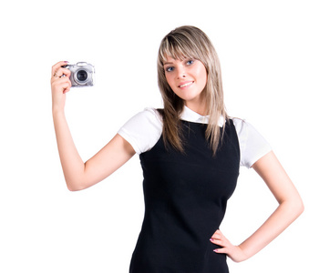 年轻女子手持数码相机图片