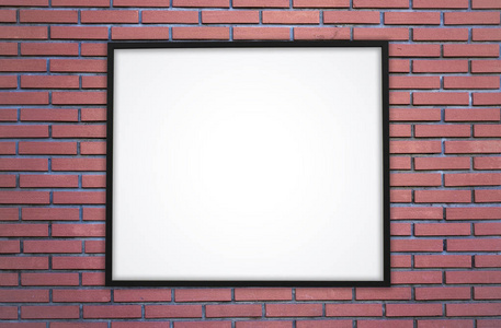 砖壁和白色屏幕或在一个黑色框架海报