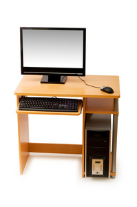 电脑和桌子被隔离在白色上