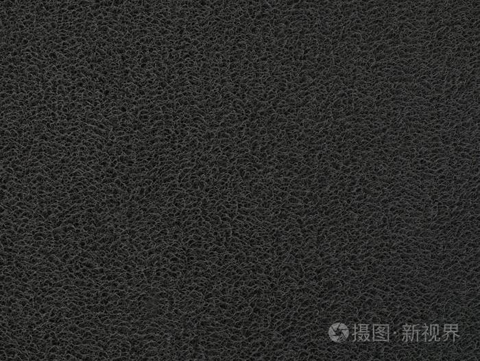 纹理背景的黑色塑料门垫