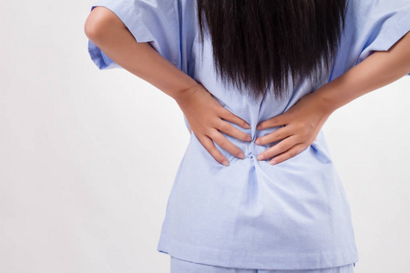 女病人患有腰痛 骨干光盘或脊柱肌肉损伤