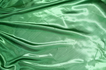 光滑优雅的绿色丝绸可以用作背景