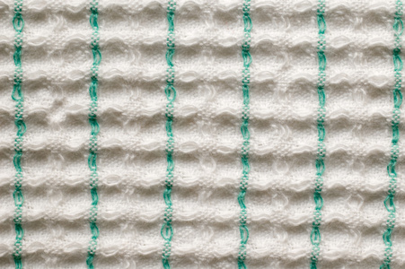 布，织物 一块布 用作某种用途的布，桌布，擦布，揩布 统称牧师