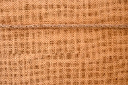 棕色织物纹理从表面胶合板纺织为背景