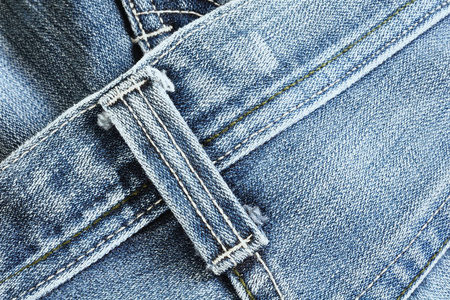 关闭的粗斜纹棉布牛仔裤贴图带循环的细节