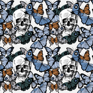 无缝的蝴蝶和骷髅头图案照片
