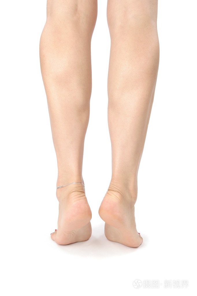 女人的腿和脚被隔离在白色上
