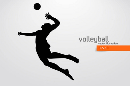坚韧不拔的剪影排球运动员的剪影照片
