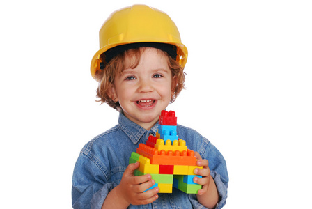小女孩建造玩具积木房子